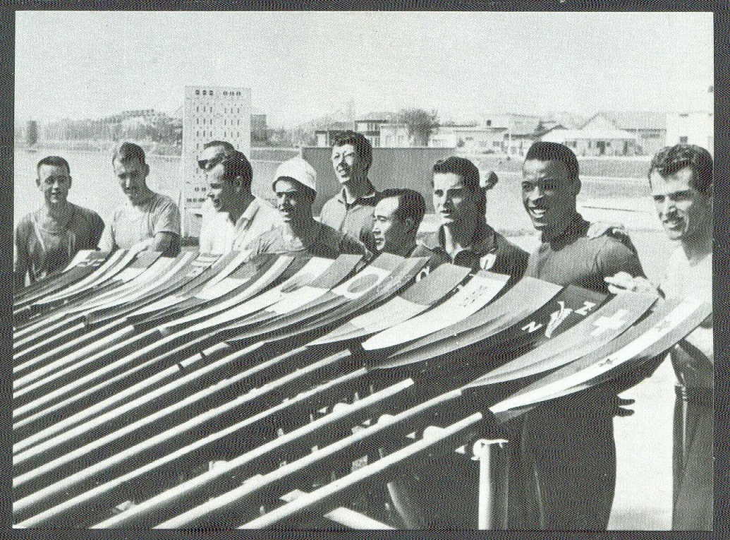 cc ned 1964 brio olympische spelen series g photo no. g1 oarsmen from many countries with their oarblades painted in national colours at the shore of the toda regatta course
