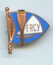 pin rom rowing and yachting federation golden blade with sail and letters frcy on blue background 