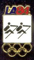 pin usa 1984 og los angeles golden pictogram on white background with la84 above and olympic rings underneath 
