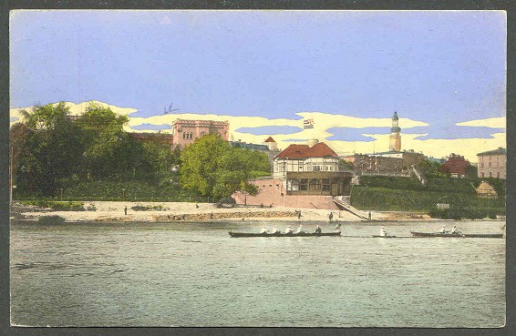 pc ger glogauer rc neptun 1918 phto of boathouse with three boats on the water in foreground 