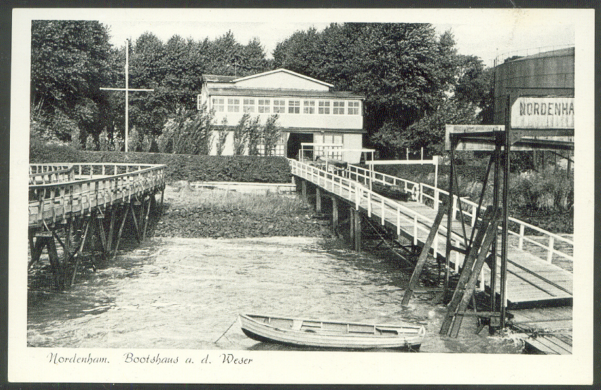 pc ger nordenhamer rc boathouse with wooden bridge between shore and pontoon on tidal water