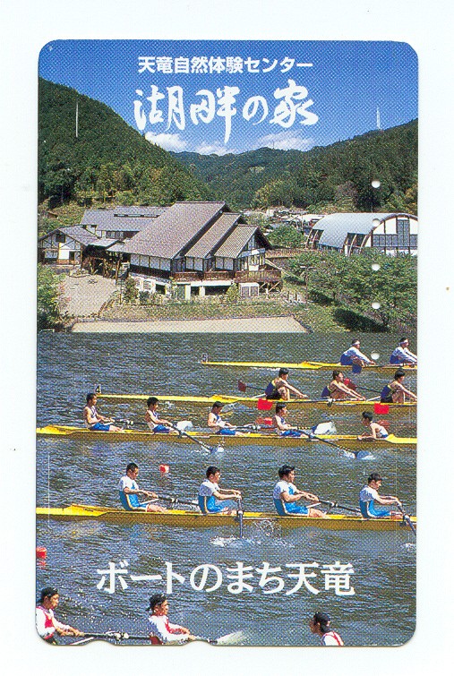 tc jpn five 4 racing abreast with houses in background
