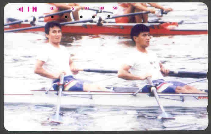 tc jpn m2x in white boat with red m2x in background