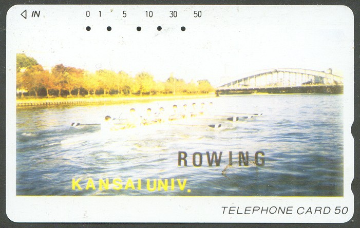 tc jpn kansai univ. rowing 8 in sunlight heading towards bridge